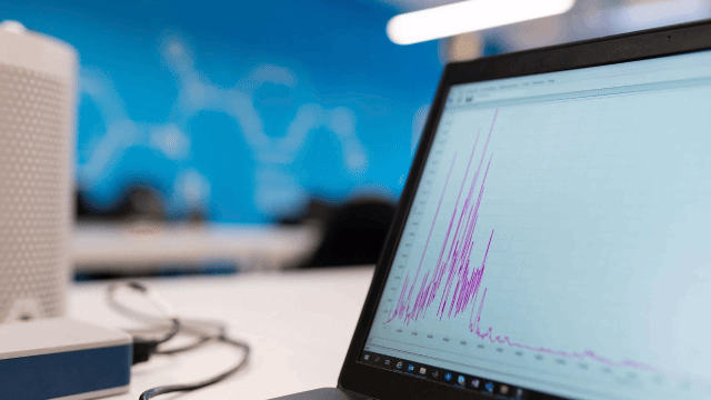 Live revenue analytics on laptop — pipeline intelligence and forecasting